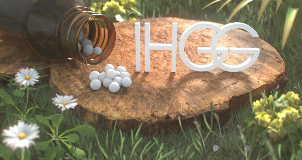 Logo IHGG com esferas homeopáticas